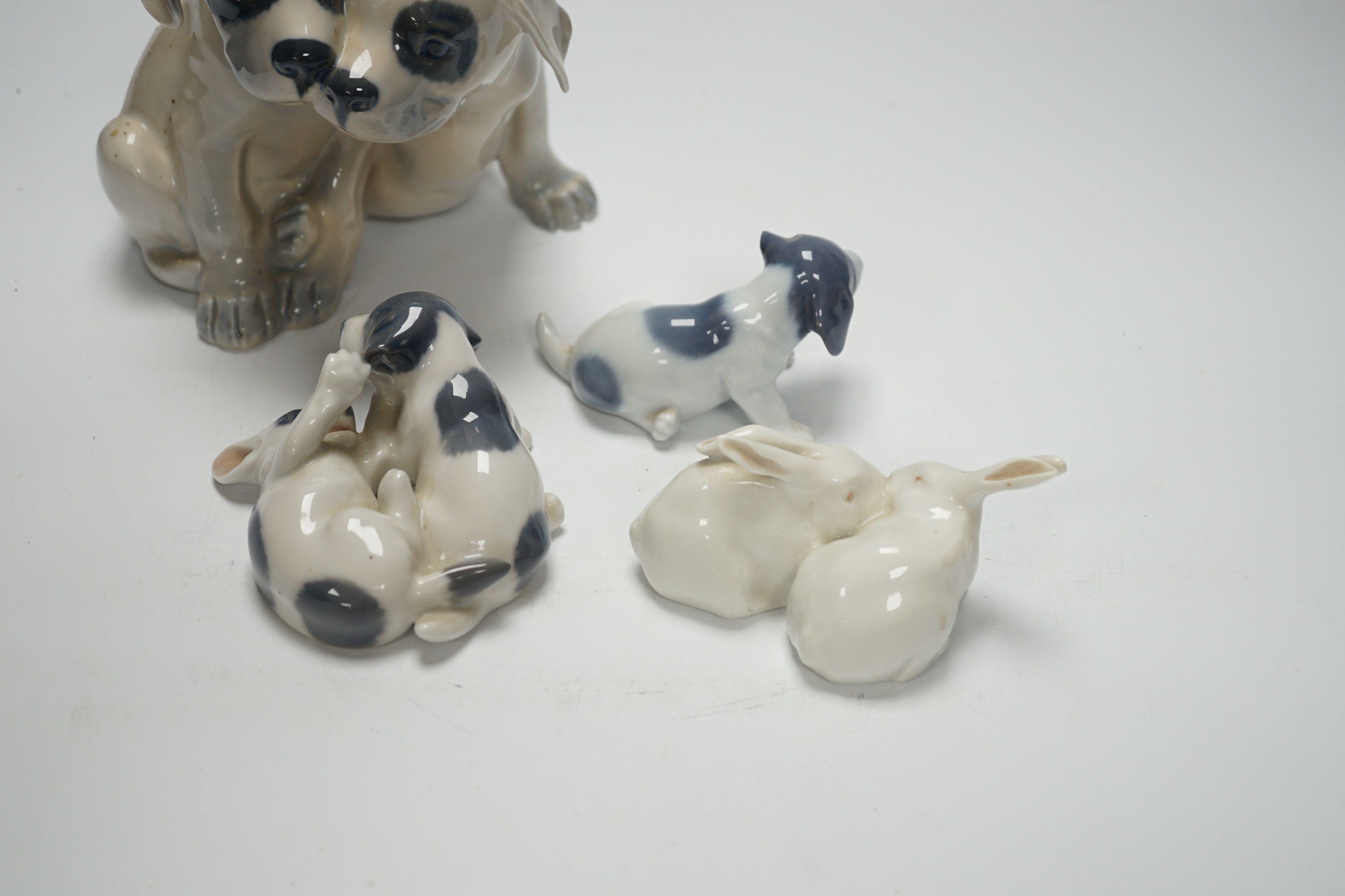 Four Royal Copenhagen animals, dogs and rabbits, tallest 15cm